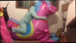 Video 1340219705: riding inflatable, inflatable toy, riding bouncing, riding pink