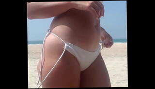 Video 1617285425: pissing peeing girls, bikini pee, public peeing girls, women peeing, big ass pee, beach pee, white bikini, pissing fat