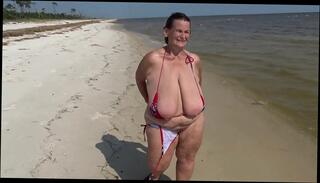 Video 1028352465: huge saggy tits granny, mature granny gilf, beach saggy tits, tits flopping, flip flop, beach nudity, curvy gilf, titty