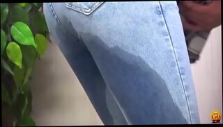 Video 1624043615: pissing peeing, girl pees jeans, cute girl pee