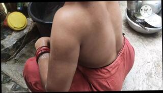 Video 1618225921: woman washing, indian woman, woman outside, straight