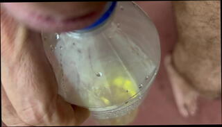 Video 1596915425: pissing peeing, pee bottle